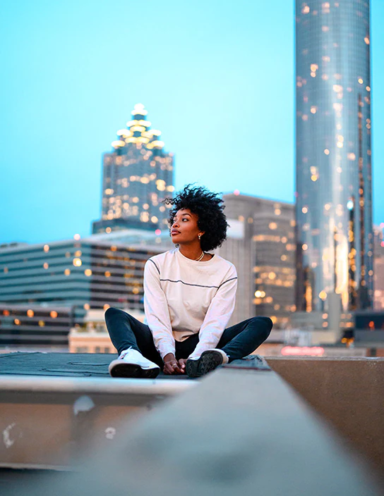 girl sitting on roof